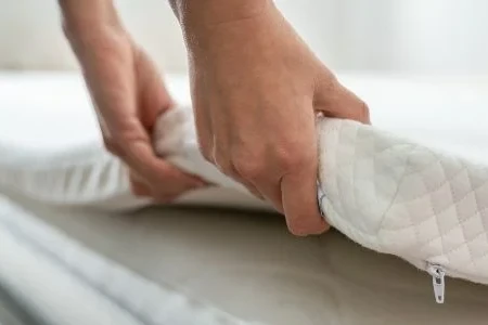 Cheap Way to Revitalize an Old Mattress? Top It With a Mattress Pillow 