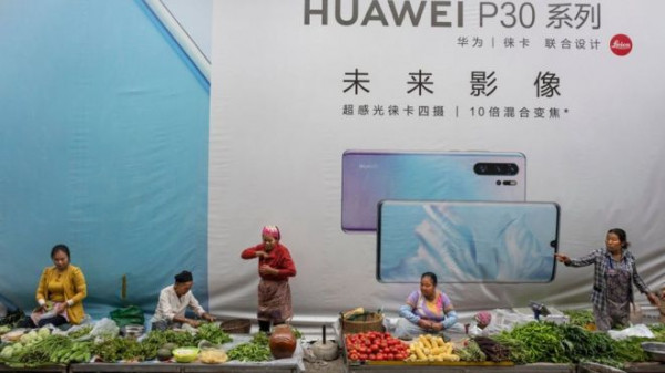 Huawei sees trouble ahead despite revenue rise