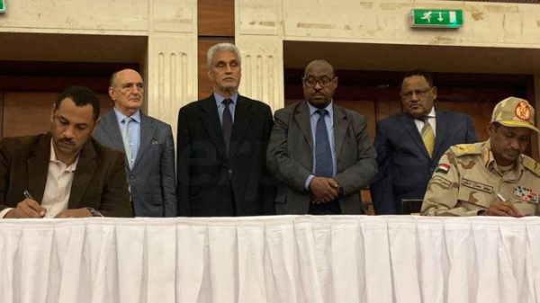 Sudan junta and civilians sign power-sharing deal