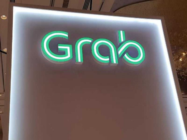 Singapore's Grab launches pilot motorbike-hailing service in Malaysia