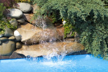 How to Build a Pool Rock Waterfall for a DIY Homeowner in Four Steps