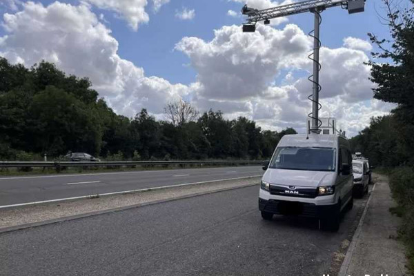 Artificial Intelligence police van detects drivers using mobile phones