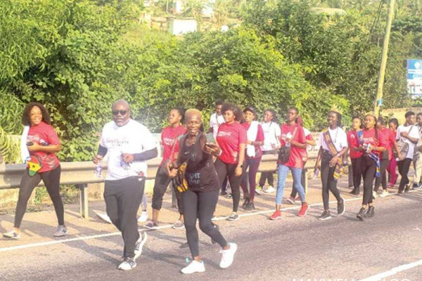 Patrons walk to promote cocoa products