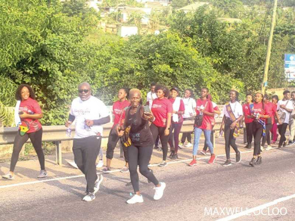 Patrons walk to promote cocoa products