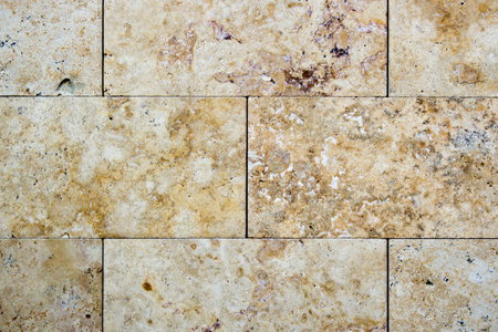 Why Use Travertine for a Bathroom Counter and Backsplash