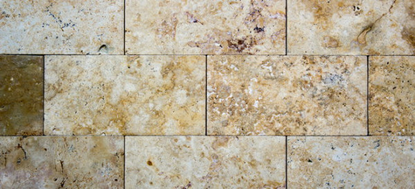 Why Use Travertine for a Bathroom Counter and Backsplash