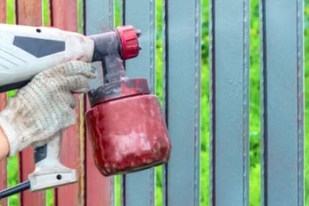 How to Spray Paint a Fence with Old Paint on It
