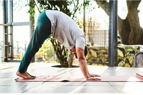 7 Yoga Stretches to Help You Shake Off Sickness