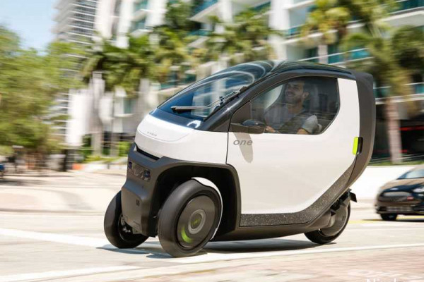 Nimbus launches a tiny EV prototype that’s like a motorbike with a roof