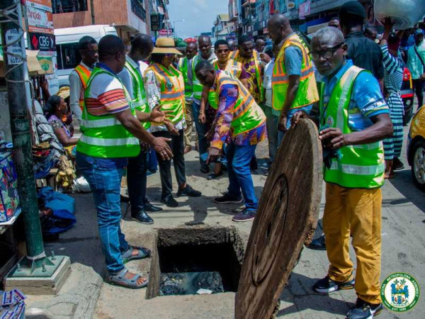 AMA locks shops in Accra with unclean frontages, drains; owners to be prosecuted