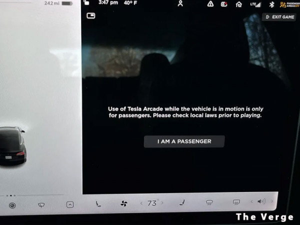 Tesla will stop letting people play games in cars that are moving